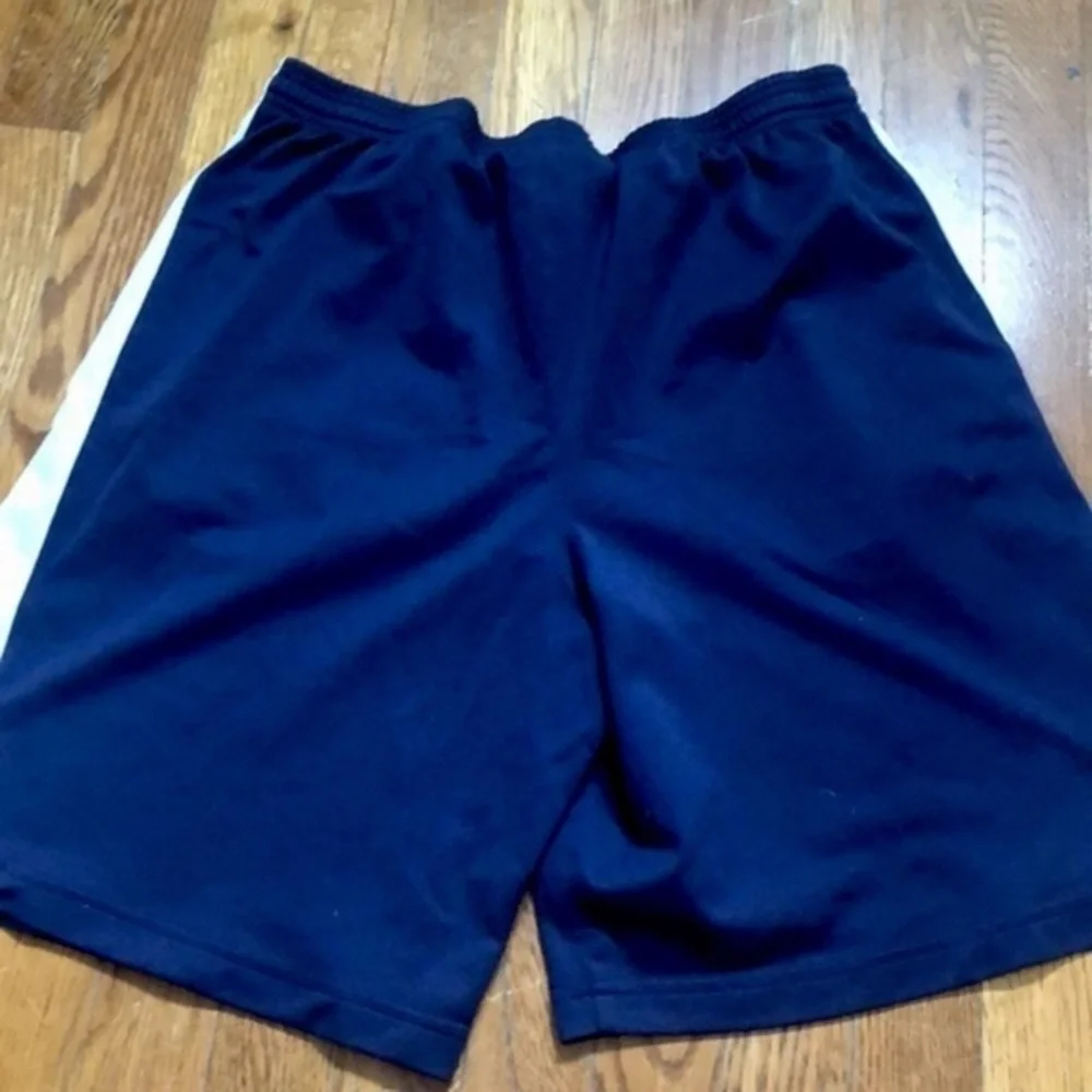 Under armour blue drawstring athleticWorkout shorts with pockets size medium